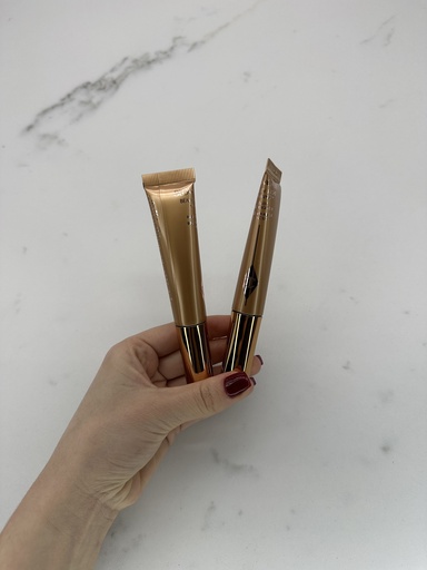 Charlotte Tilbury Goldgasm Highlighter Pa Kuti Me Defekt Shkrimi 